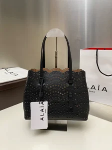 alaia-bag-black-handbag-looks-like