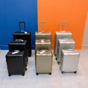 rimowa-luggage-black-silver-gold-looks-like